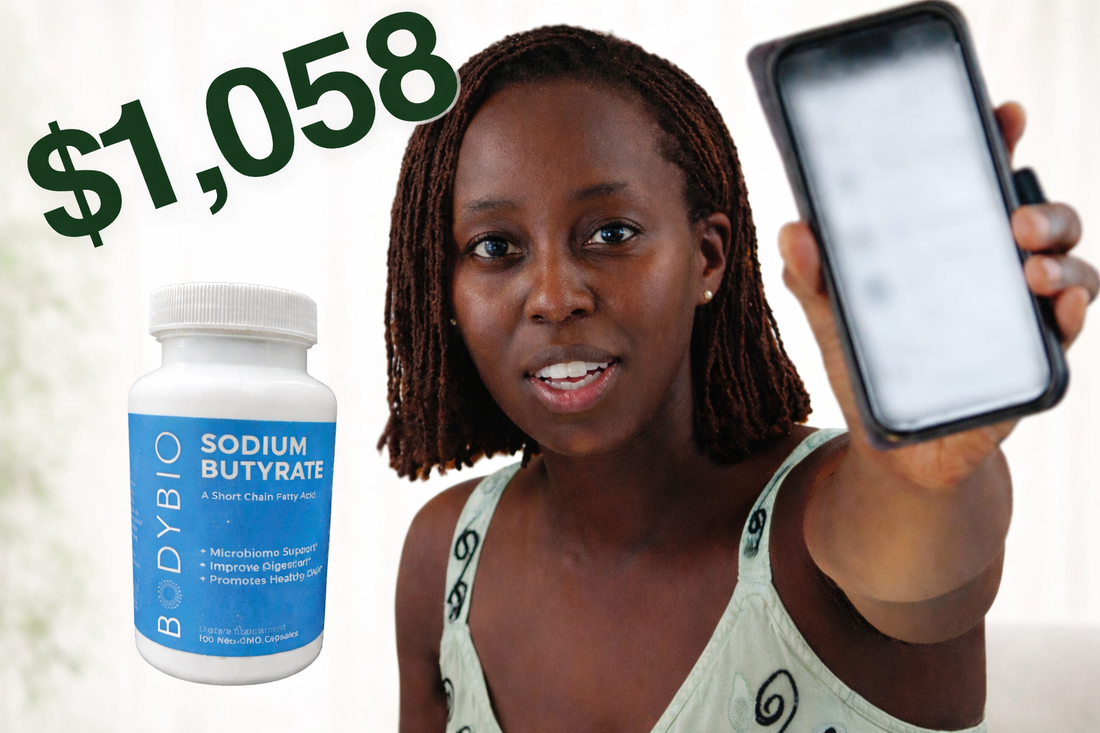 Vivienne Lamb holding up her phone with a bottle of sodium butyrate next to her with the number "$1,058"over her head